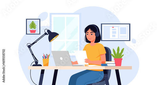Young woman working from home, using laptop and headphones. Perfect for websites, blogs, or articles about remote work, online education, or freelance lifestyle.