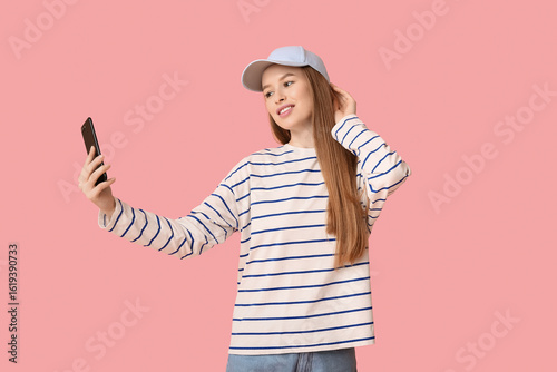 Beautiful young woman in st...