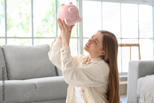 Bankrupt young woman with e...