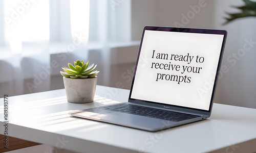 Laptop with 'I am ready to receive your prompts' text, symbolizing AI readiness, content creation, and modern workflow.