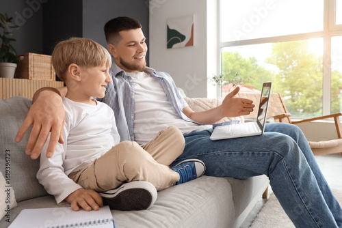 Father and son learning tog...
