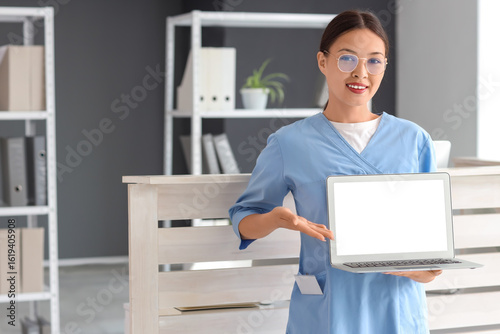 Young female medical recept...