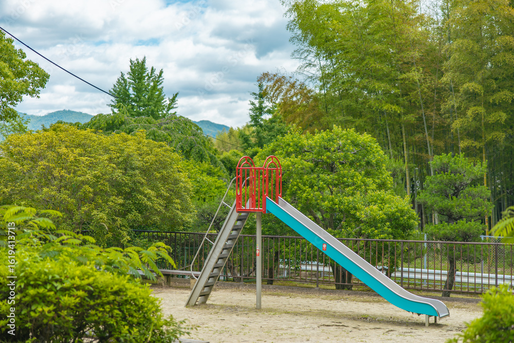 ols school slide in a park ols school slide in a park