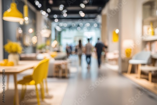 Blurry interior of a furniture store with people browsing