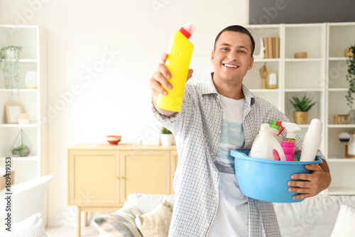 Young man with cleaning sup...