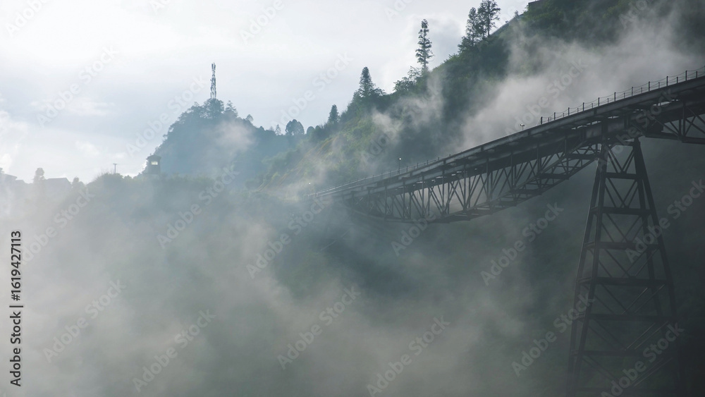 Fototapeta premium Fog flowing on the monorail funicular track