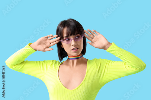 Beautiful young woman in ra...