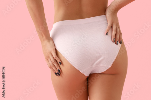 Young woman in underwear wi...