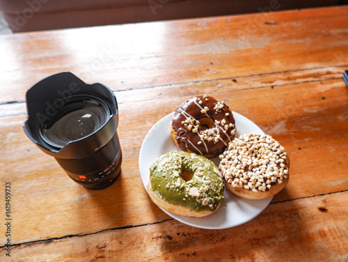 Work from cafe, accompanied by various flavor donuts, matcha, peanut and chocolate