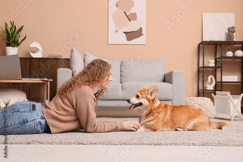 Cute Corgi dog and his owne...