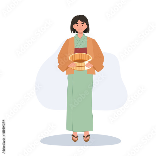 A calm Japanese woman in yukata stands holding a bath bucket and towel.