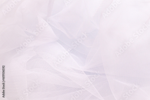 A close-up photo of beautiful, elegant, soft, detailed, textured, and wavy tulle fabric.