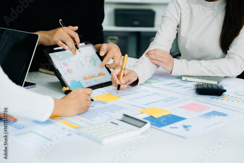 Photos Businessman and team analyzing financial statement Finance task