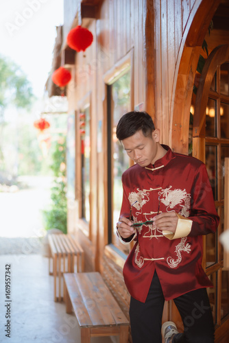 A man dressed in Chinese New Year clothing