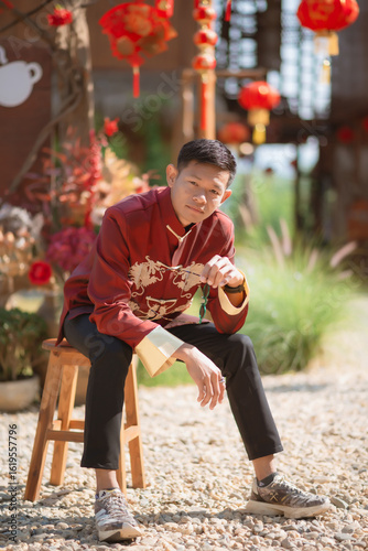 A man dressed in Chinese New Year clothing