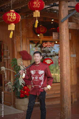 A man dressed in Chinese New Year clothing