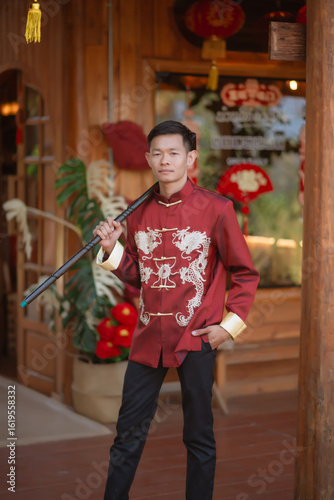 A man dressed in Chinese New Year clothing