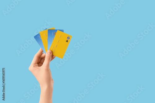 Hands with credit cards on ...