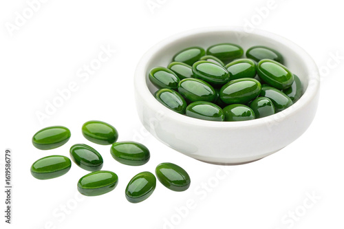 Green gel capsules in a white bowl isolated on transparent background