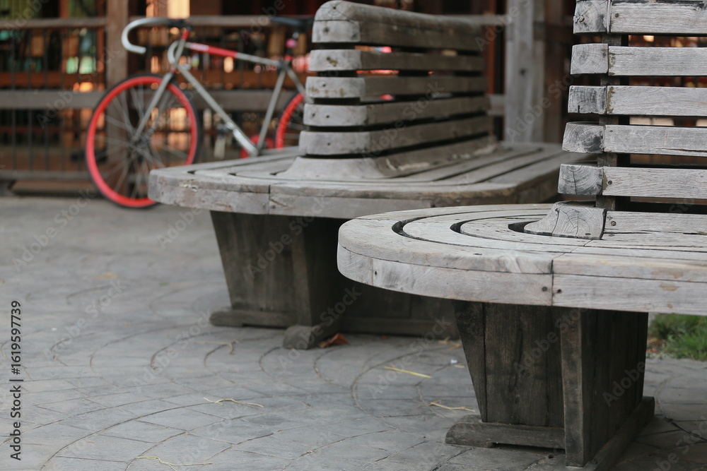 Naklejka premium Wooden Benches and Bicycle