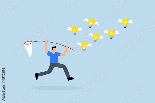 Capture new business ideas, businessman hunts and catches ideas to fly light bulbs with butterfly net.