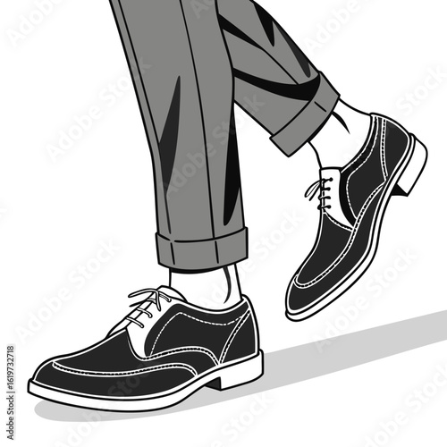 Man wearing stylish black and white wingtip shoes and grey trousers walking