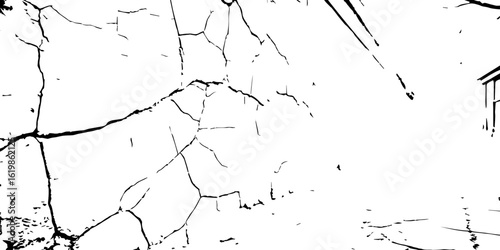 Cracked wall texture in high contrast black and white, perfect for grunge backgrounds, decay effects, or aged urban design references.
