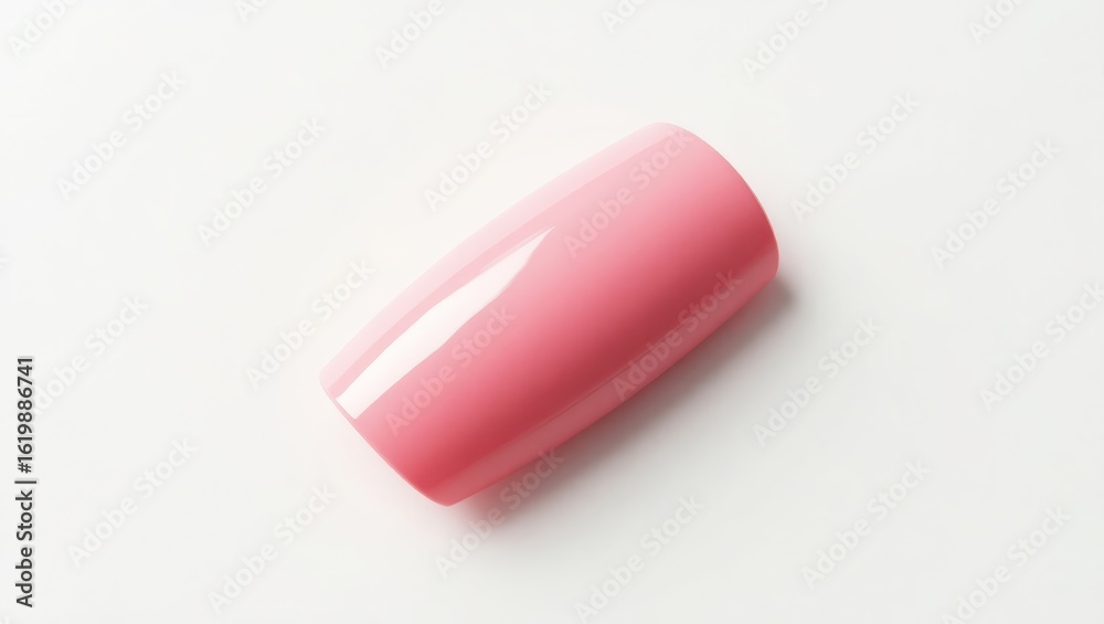 A small, oval-shaped, light-pink cosmetic product. A small, oval-shaped, light-pink cosmetic product.