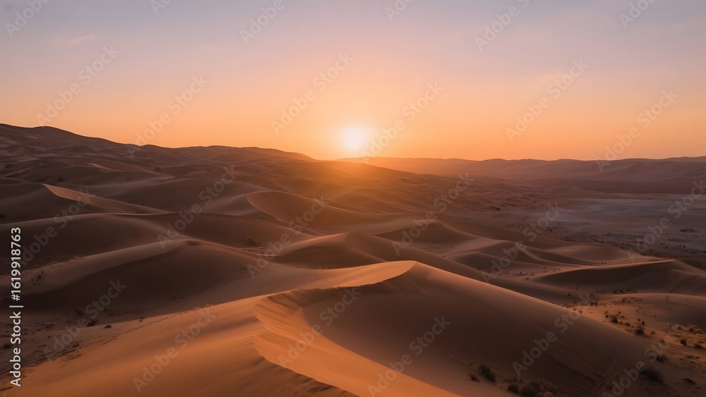 Fototapeta premium Golden Sunset Over Rolling Sand Dunes in the Desert