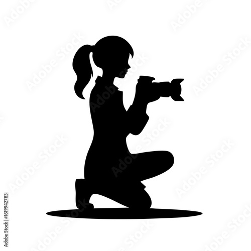 Woman photographing with camera while kneeling on the ground  