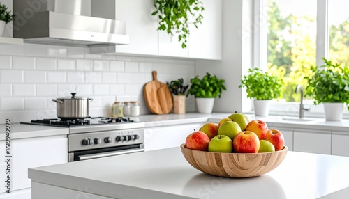 Cocina moderna luminosa, encimeras blancas, electrodomésticos de acero inoxidable, frutero con manzanas, orden y limpieza, sin personas