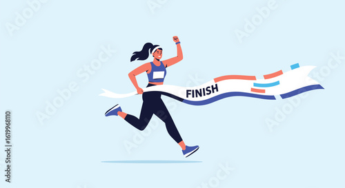 An athletic woman crosses the finish line with determination during a race event