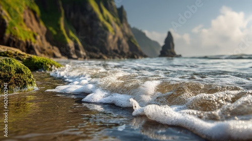 Ocean Waves Crashing on Rocky Shore with Green Moss Coastline Background A Stunning Seascape Image