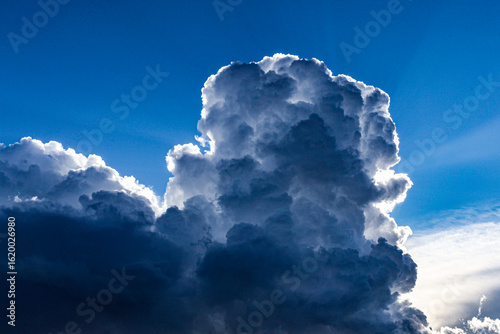 cumulonimbus clouds in the blue sky