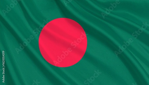 Bangladeshi national flag with red circle on a green field, symbolizing bloodshed and lush land, shown in gentle daylight