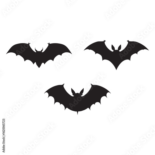 Vector art of three bat silhouettes isolated on white background