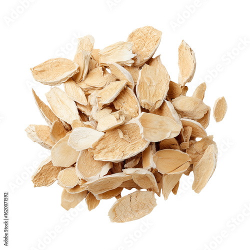 Dried sliced astragalus root isolated on white background