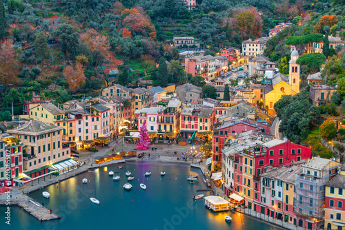 Portofino, Italy fishing village and commune in the Metropolitan City of Genova at dusk.