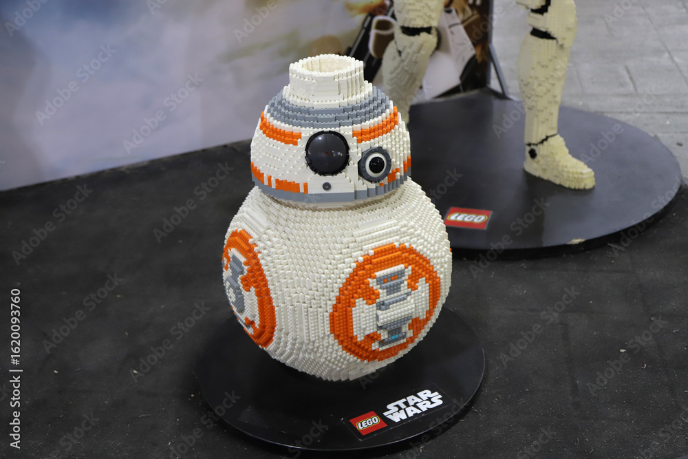 Fototapeta premium A statue of the BB-8 robot from the Star Wars films created with Lego blocks and displayed at an event