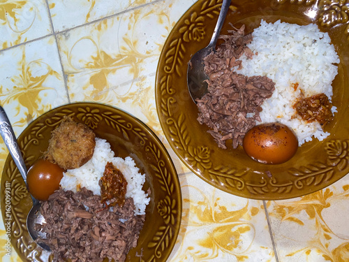 Gudeg or young jackfruit cooked for a long time with a lot of spices and brown sugar. Gudeg young jackfruit and eggs. Indonesian food. Gudeg tastes sweet.