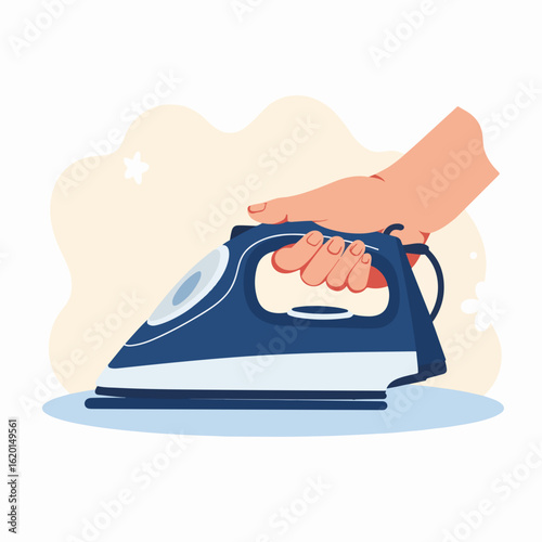Hand holding iron with blue design on smooth surface for household tasks. Ironing involves careful technique, providing smooth fabrics and neat appearance for laundry.