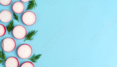 Radish Slices with Dill on Light Blue Background