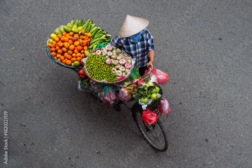 Vietnamese people selling things on the streets of Hanoi