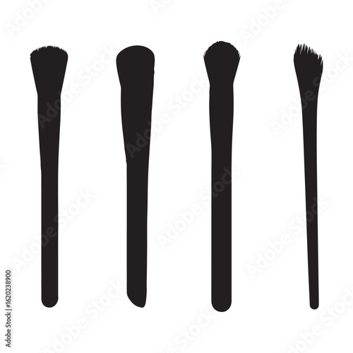 Vector art of four makeup brushes isolated on white background
