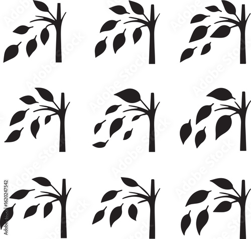 Simple black silhouette of a small tree with leaves blowing off in the wind
