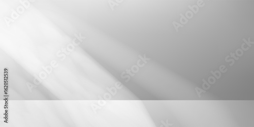 Studio with textured wall and soft tree shade. Sunlight and leaf patterns form abstract overlay. Cream podium on gray floor. Elegant mockup template for skincare, home or seasonal display.