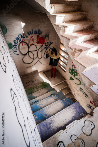 Wallpaper Mural Halloween Pumpkin Head Girl in Urban Graffiti Scene with a red balloon. Torontodigital.ca
