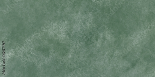 Abstract Elegant dark green background with mottled vintage texture in old fancy background design, texture of colored parchment paper.	