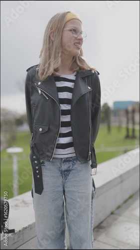 Young student posing in urban park