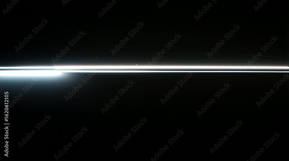 Abstract minimalist video of a thin LED light beam gliding slowly ...